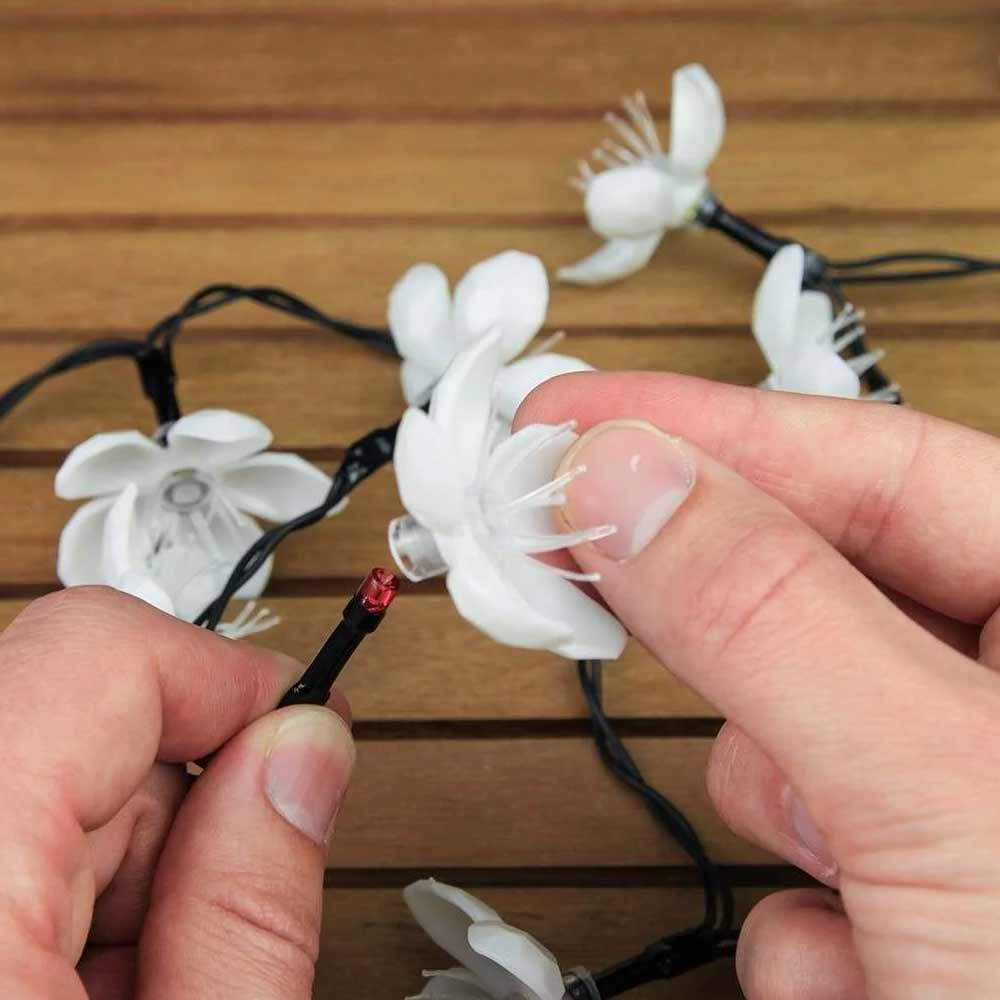 50 Cherry Blossom Solar Flower Lights showing gow to attach flowers