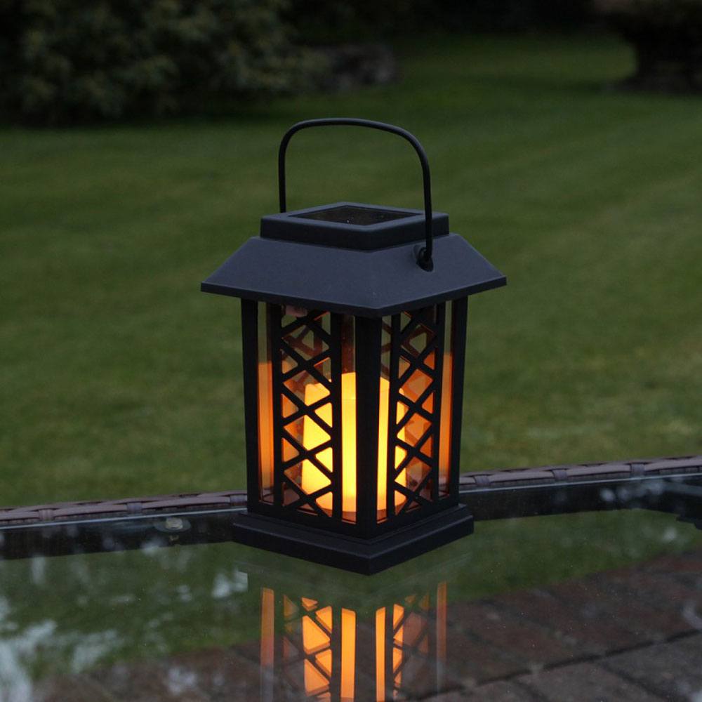 Black Solar Candle Lantern at dusk