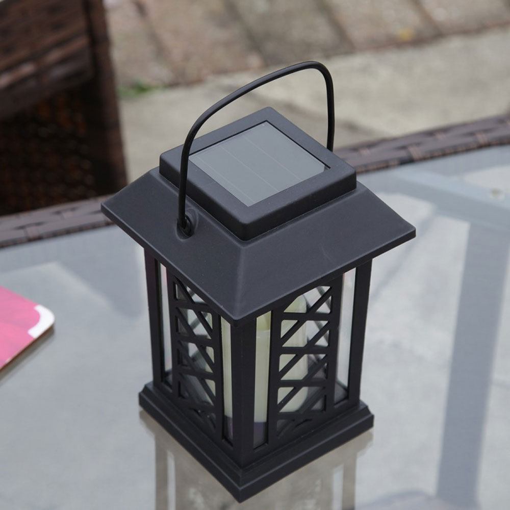 Black Solar Candle Lantern in daytime close up