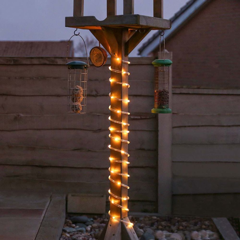 Connectable Rope Lights on brid feeder in garden