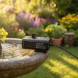1260028-G in a cascade water feature — lifestyle in garden setting