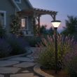 Solar Powered Sirius Stake Light in garden at night time Showing IP65 waterproof properties