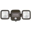 Twin Head Battery Security Light white version mounted on garage