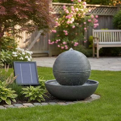 Sphere Solar Water Feature – stone-effect sphere with water flowing and LED lighting on patio