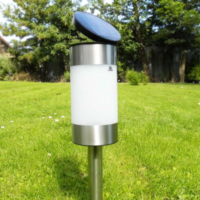 Solar Garden Path Lights Saturn All Year round UK Performance - 2 Pack located in a gorgeous garden with the Tiltable lid angled up for winter optimization