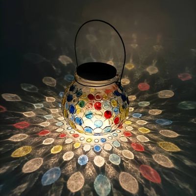 Hand-Painted Solar Glass Jar Lantern – Stained Glass, Table or Hanging showing the beautiful natural LED colour 