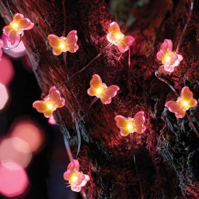 Smart Solar 30 Butterfly Firefly String Lights in tree in garden at night time