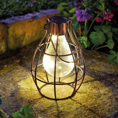 Smart Solar Eureka Firefly Lantern in garden at night