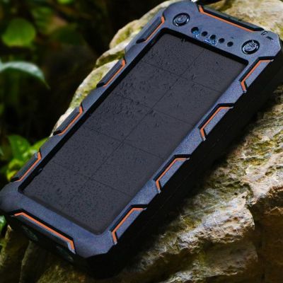 Solar Power Bank ShockProof outside charging on rock charging in sun