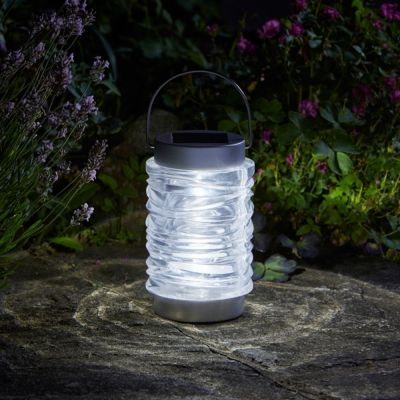 Wave 365 Solar Lantern at night in garden