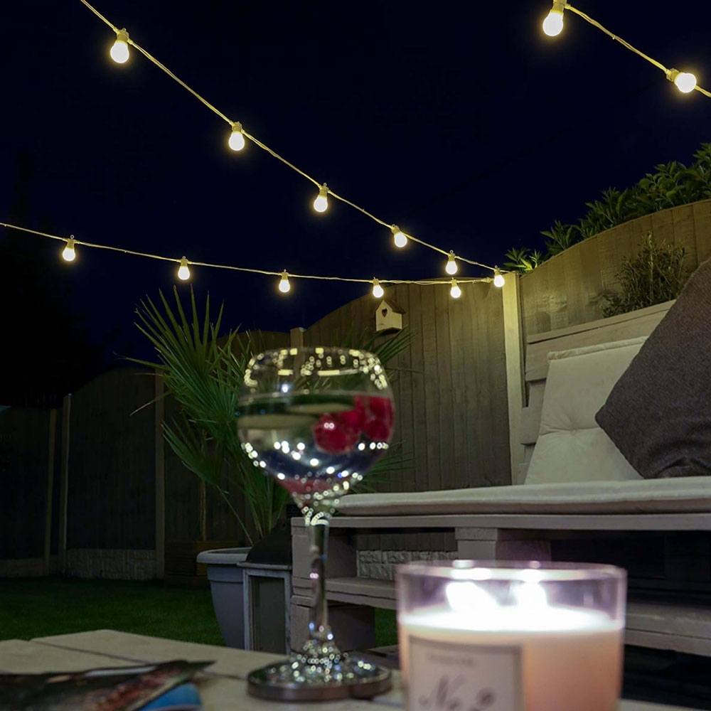 Festoon Lights Connectable Frosted Bulb White Cable in garden
