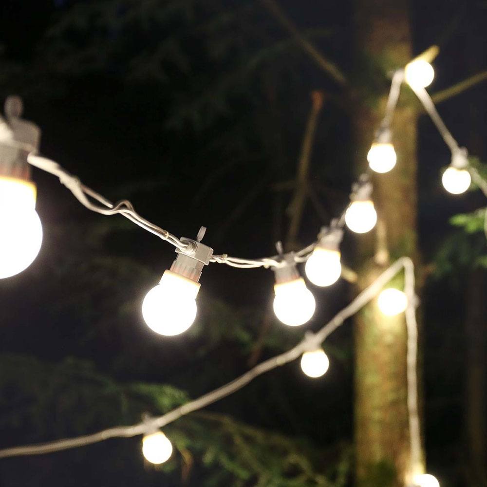 Festoon Lights Connectable Frosted Bulb White Cable in trees