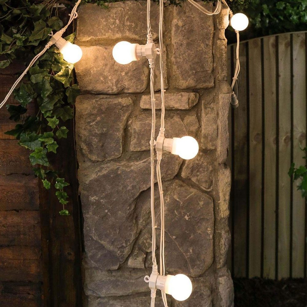 Festoon Lights Connectable Frosted Bulb White Cable hanging on wall