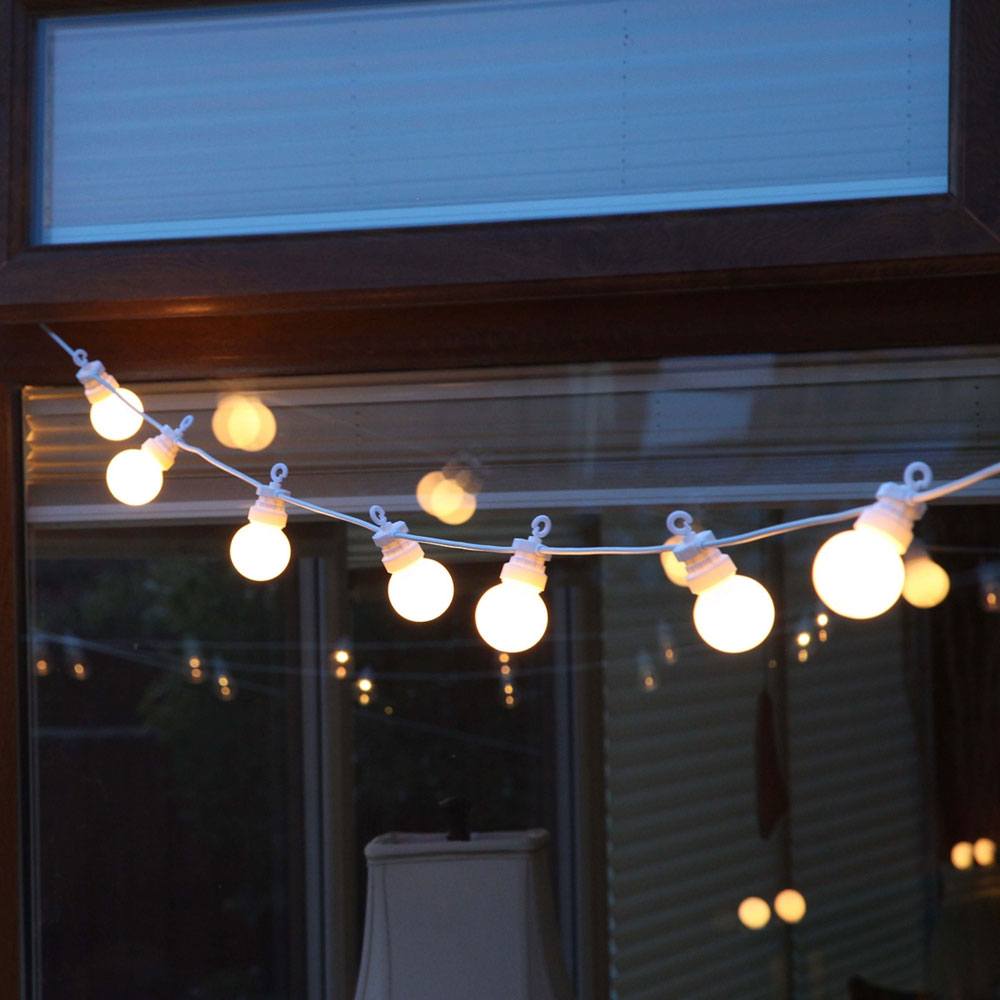 Outdoor Festoon Lights Connectable Warm White strung across garden