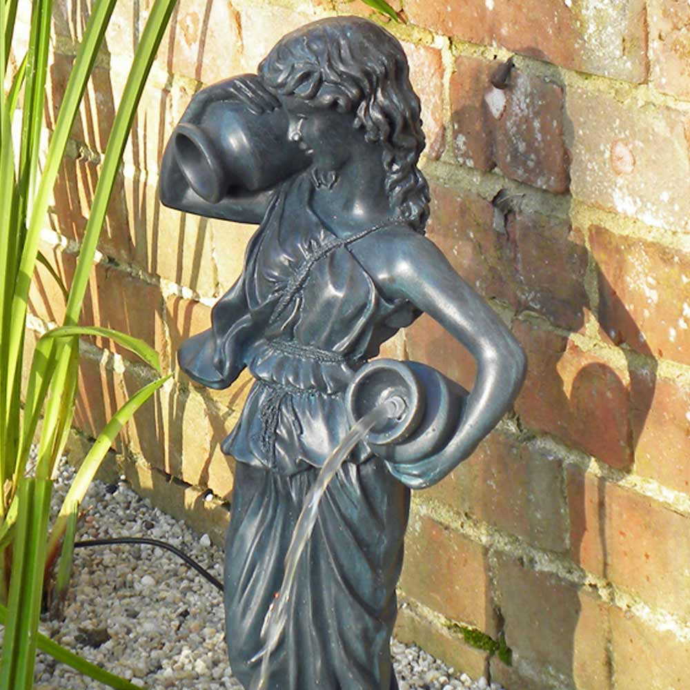 Lucia Solar Pond Spitter Statue - close up of Lucia beside pond