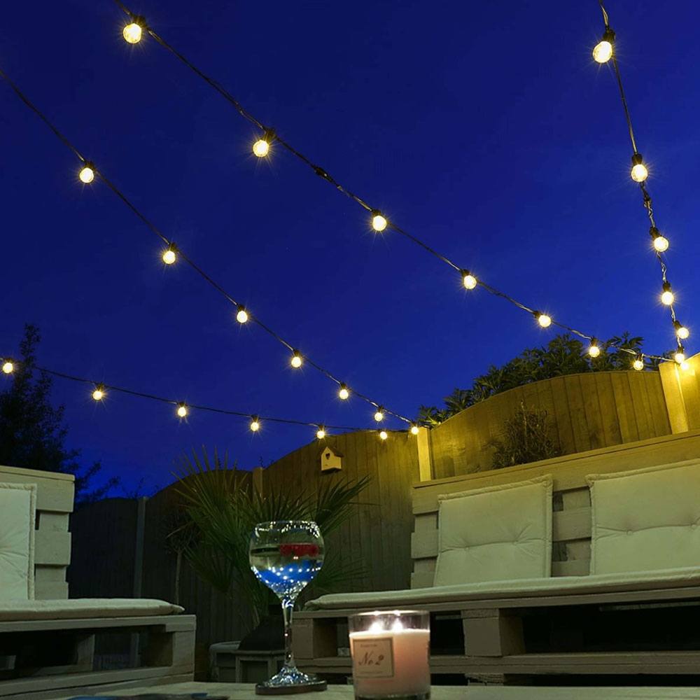 Outdoor Festoon Lights Connectable Clear Bulb at night time in garden