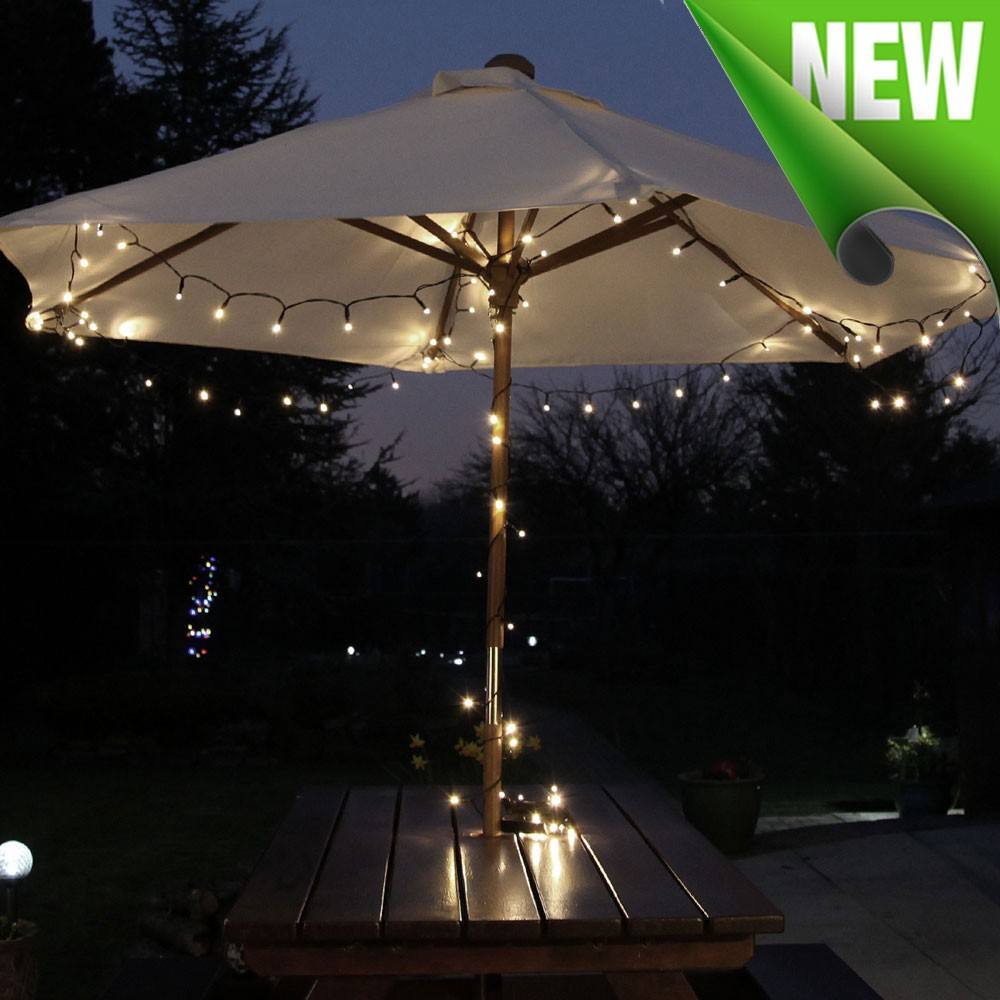 Solar Powered Fairy Lights 100 Deluxe display on Garden table umbrella