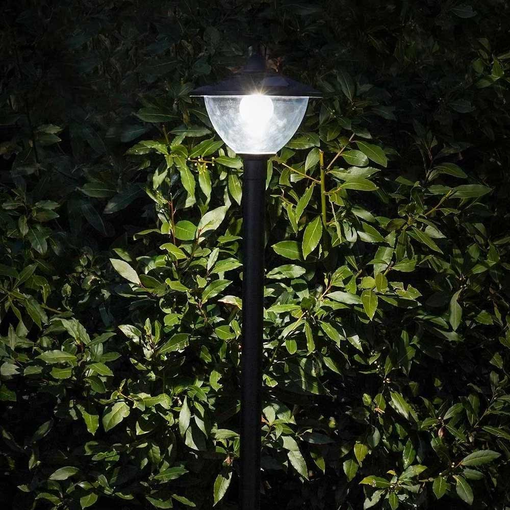 Solar Garden Lamp Post close up in garden at night time