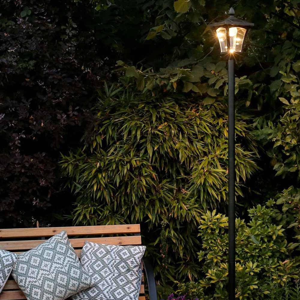 Black Solar Lamp Post 2.1 m in warm white in garden