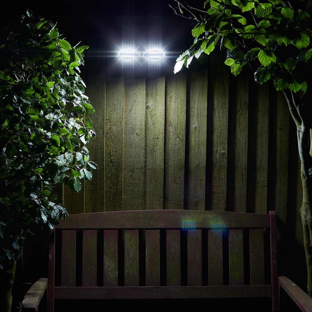 Solar Motion Sensor Light Outdoor PIR Illuminating Garden Bench at night