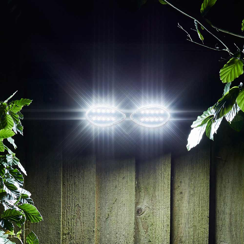 Solar Motion Sensor Light Outdoor PIR Illuminating garden at Night