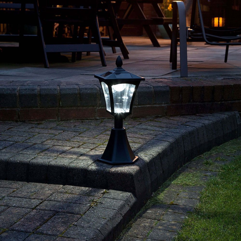 Solar Pillar Lights 6 LEDs night time on a patio staiway