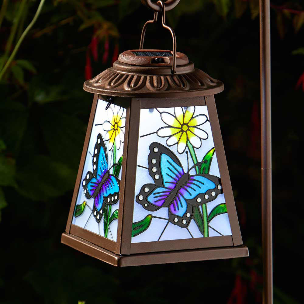 Solar Powered Butterfly Lantern close up of lantern light at night in garden