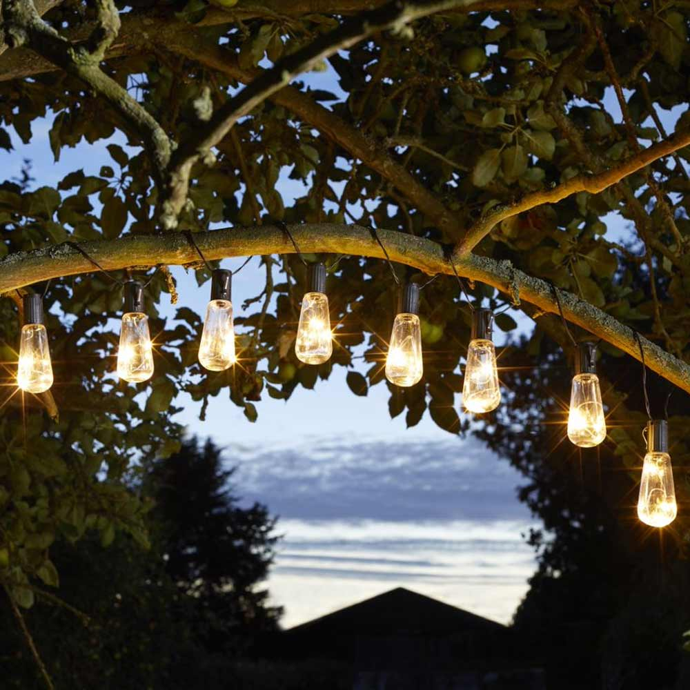 Solar Powered Festoon Lights Vintage Bulbs in tree at night