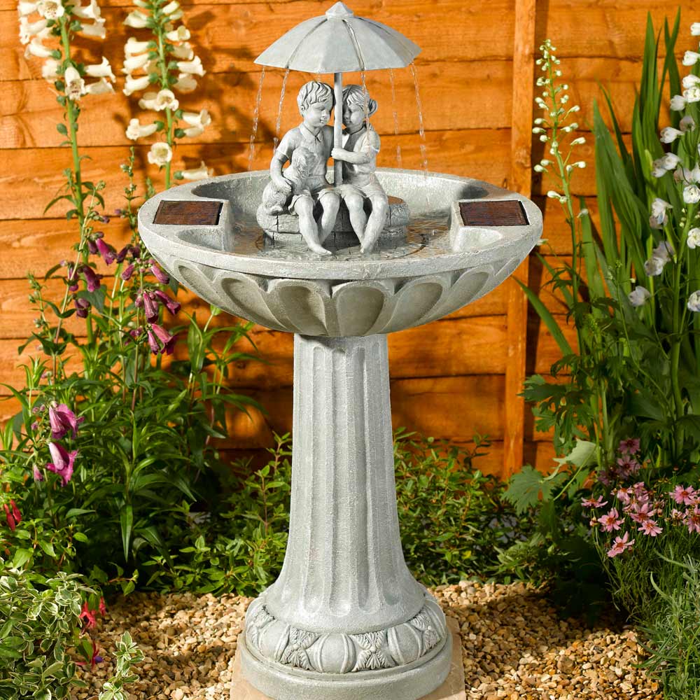 Solar Umbrella Fountain Water Feature in garden