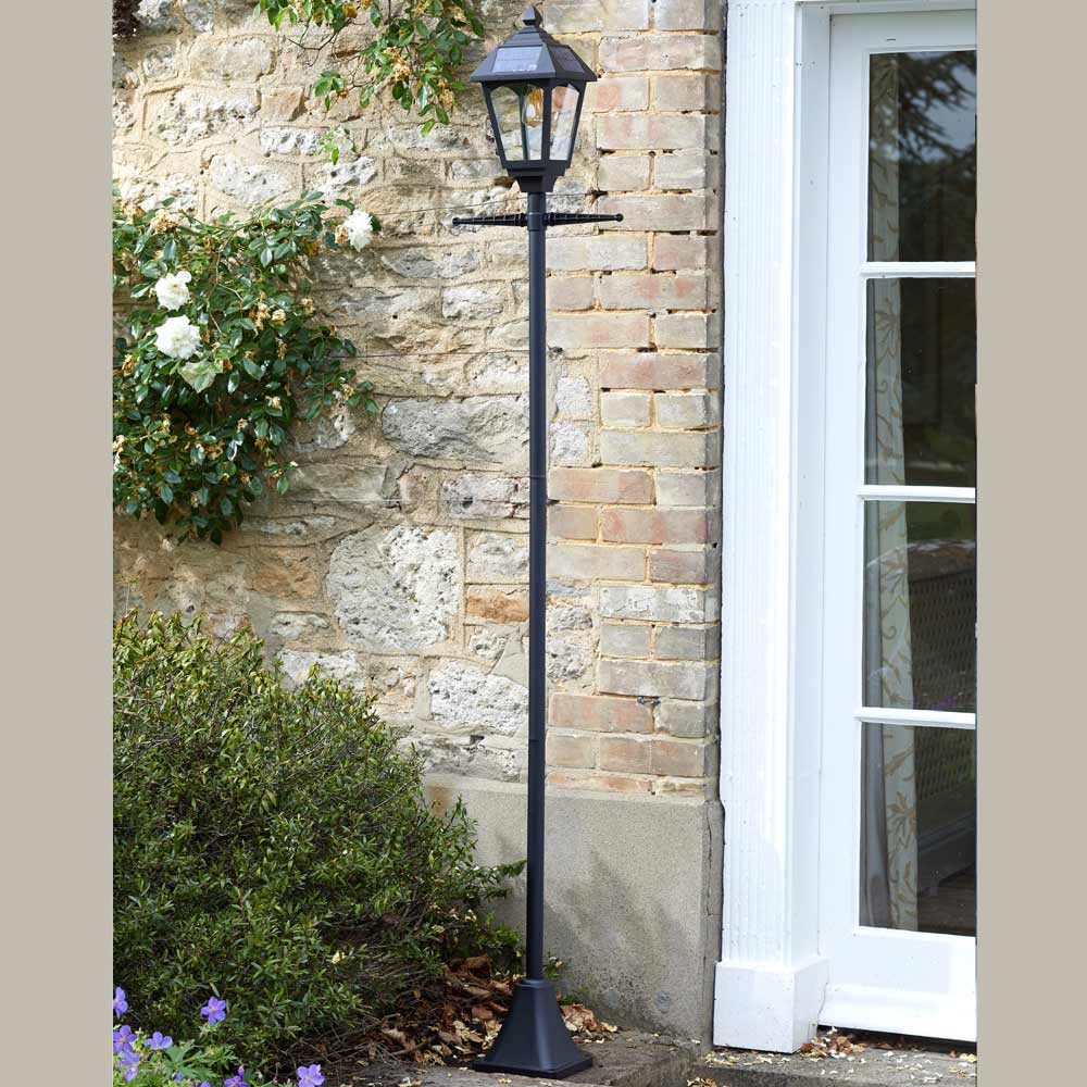 Victoriana 365 Solar Powered Lamp Post beside back door of house