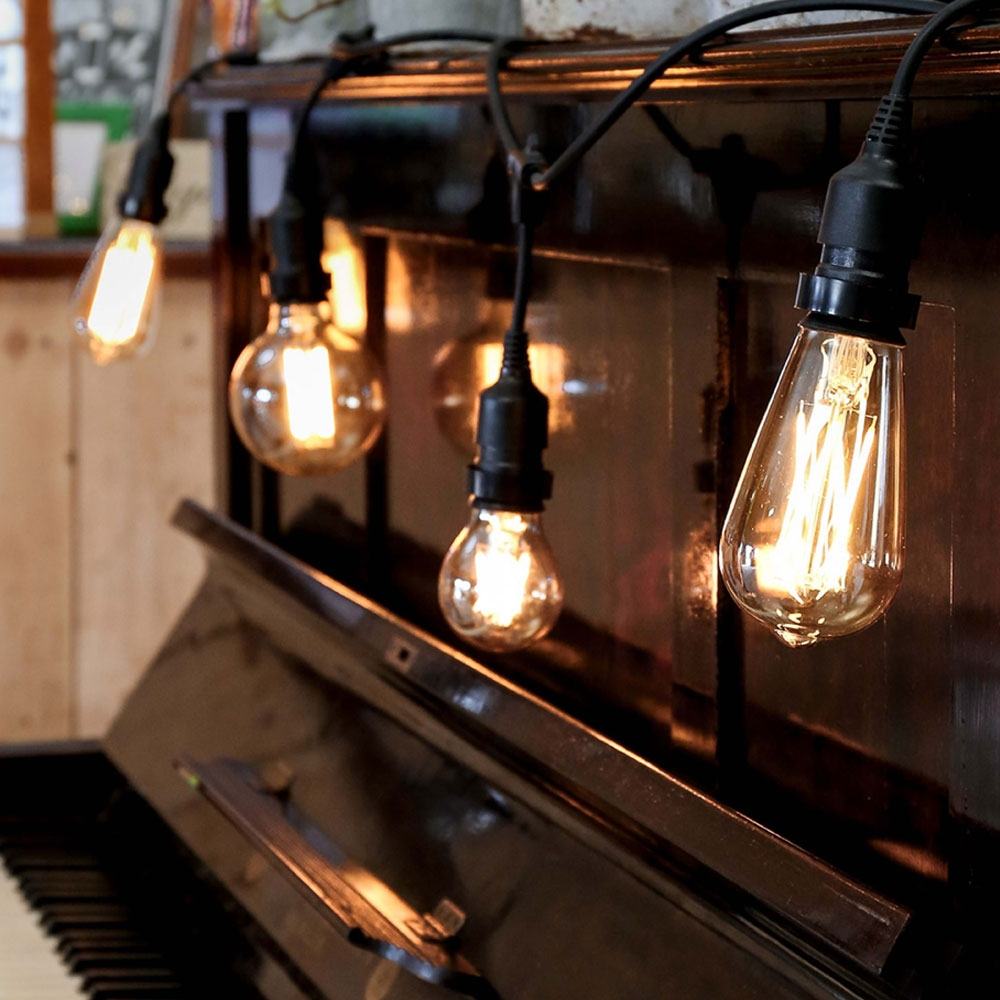 Vintage LED Festoon Lights indoor on piano display