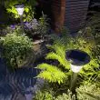 Magnum Solar Stake Light – 100 Lumen Brushed Steel – Lifestyle 3