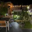 Magnum Solar Stake Light – 100 Lumen Brushed Steel – Lifestyle 3