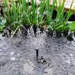 Compact Solar Fountain – 1.5W for Small Gardens Showing the high quality connections and the mounting stake for the solar panel
