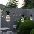 Connectable Battery Festoon Lights Large Traditional Bulbs on fence turned on