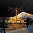 Horizon solar lamp post on a paved plaza at night
