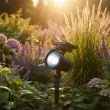 Ultra 365 solar spotlight pair illuminating a lawn at night