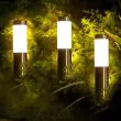 Compact Solar Powered Bollard Style Light - 4 Pack Installed along a pathway in a garden