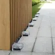 2 White Solar Garden Glass Brick Lights being used in various locations around the garden and driveway 