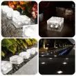 2 White Solar Garden Glass Brick Lights being used in various locations around the garden and driveway 