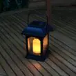 Solar Candle Lantern Black – Flickering Amber LED, 15cm Outdoor – Lifestyle