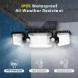 Compact Solar Security Floodlight With Three Adjustable Heads Mounted Above A Back Door Illuminating The Garden Path At Night