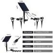 High Lumen 4‑Head Solar Garden Spotlight – Adjustable Outdoor LED In a garden highlighting a lawn area showing the two brightness settings 