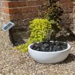 Sunspray Solar Bowl Water Feature in Marble White Showing the solar pump to panel kit