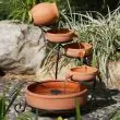 Terracotta Cascade Solar Water Feature - four-tier terracotta bowls on black metal stand shown against white background