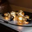 Vintage LED Festoon Lights outdoors in tree