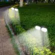 Illustration of the same Arden light charging by day and providing motion-responsive lighting at night
