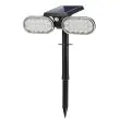 Illustration of the same Arden light charging by day and providing motion-responsive lighting at night