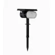 Illustration of the same Arden light charging by day and providing motion-responsive lighting at night