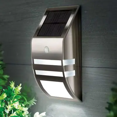 Stainless Steel Solar Wall Light – Dim To Bright Motion Sensor - showing the the unit mounted on a modern style wall